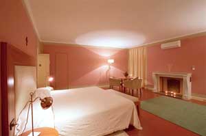 Extra large triple with city view, terrace, private facilities (bath and shower), and breakfast